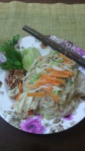 Pad thai with bean sprouts, bean curd and peanuts